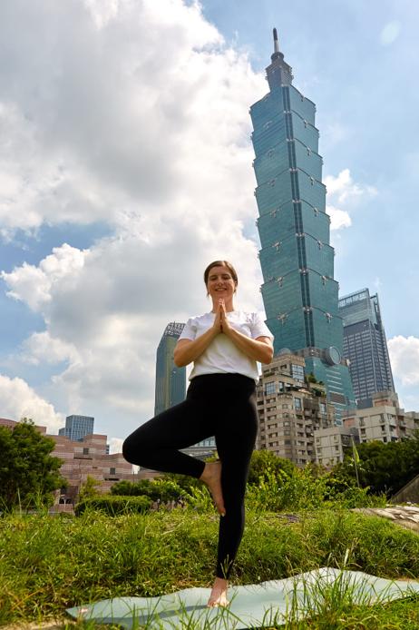 Katie, a qualified Yin yoga teacher, in tree pose